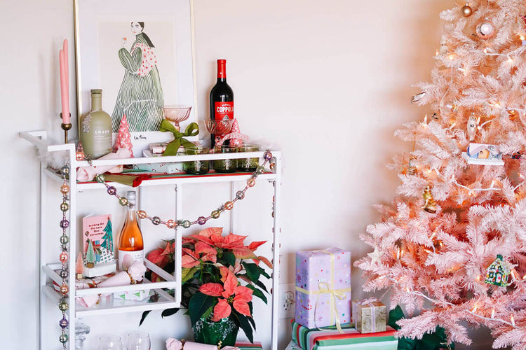 holiday party ideas with a pink and red bar cart via wallflower shop