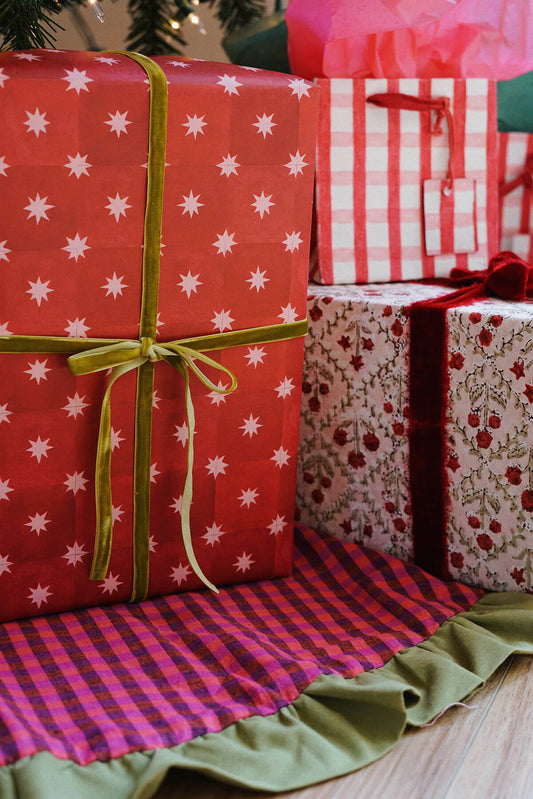 whimsical christmas gift wrap under tree red and blue star pattern wrapping paper - shop colorful maximalist holiday on wallflower