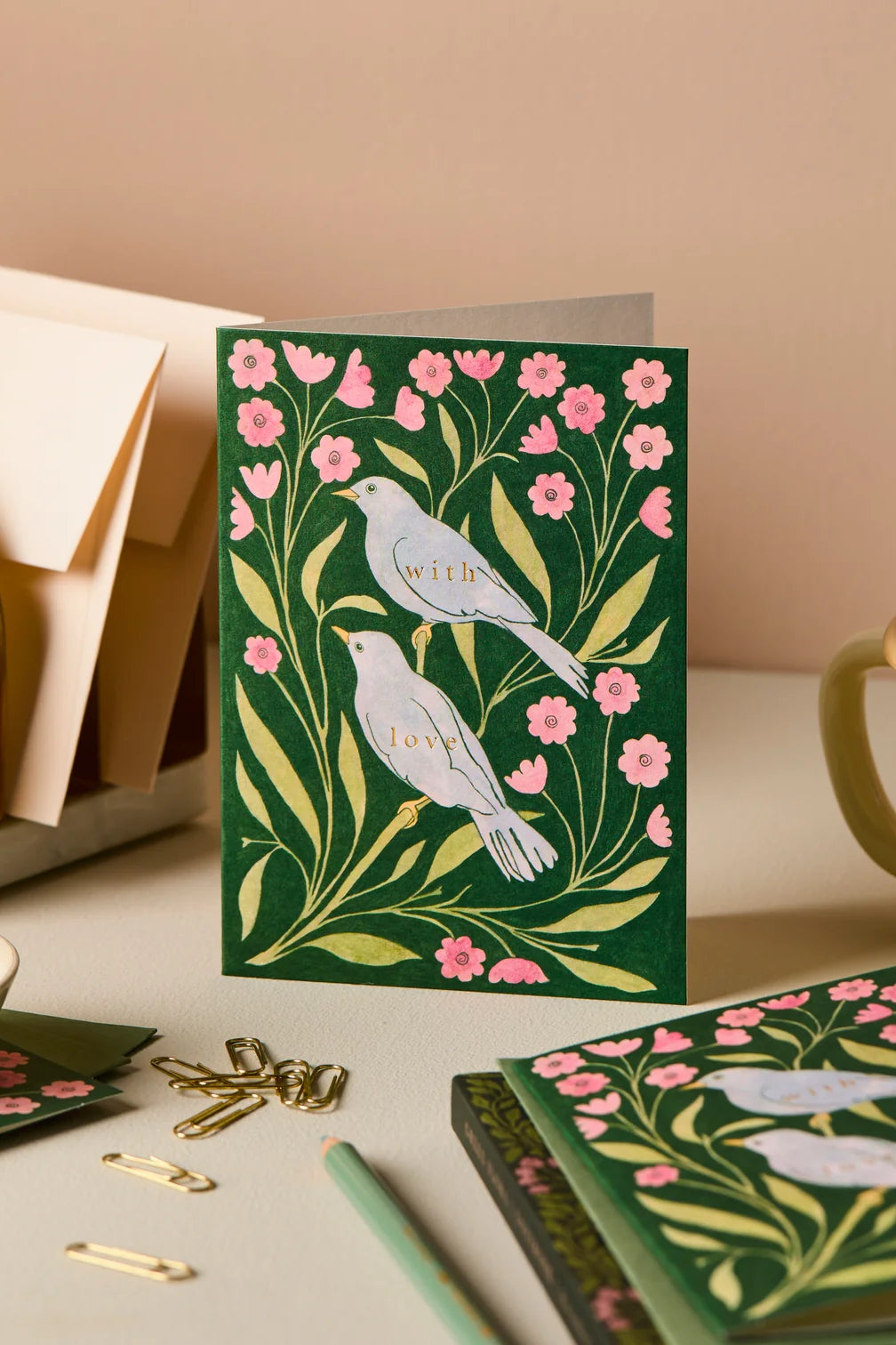 green and pink floral greeting card with birds that says "with love" in gold foil