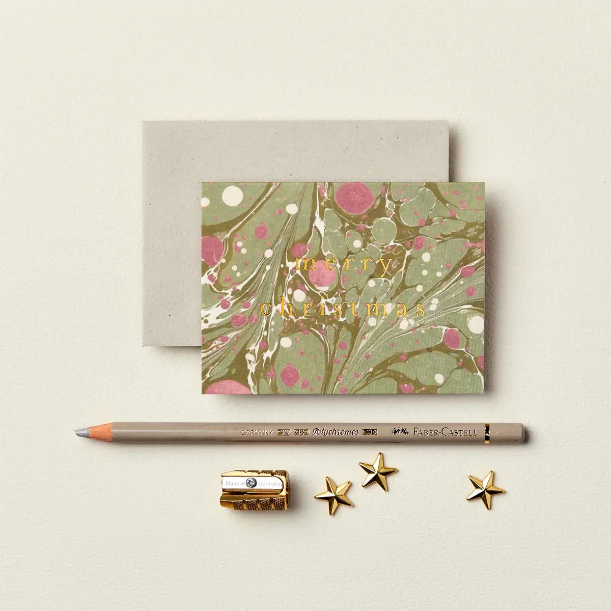 Pink and green marbled merry christmas card