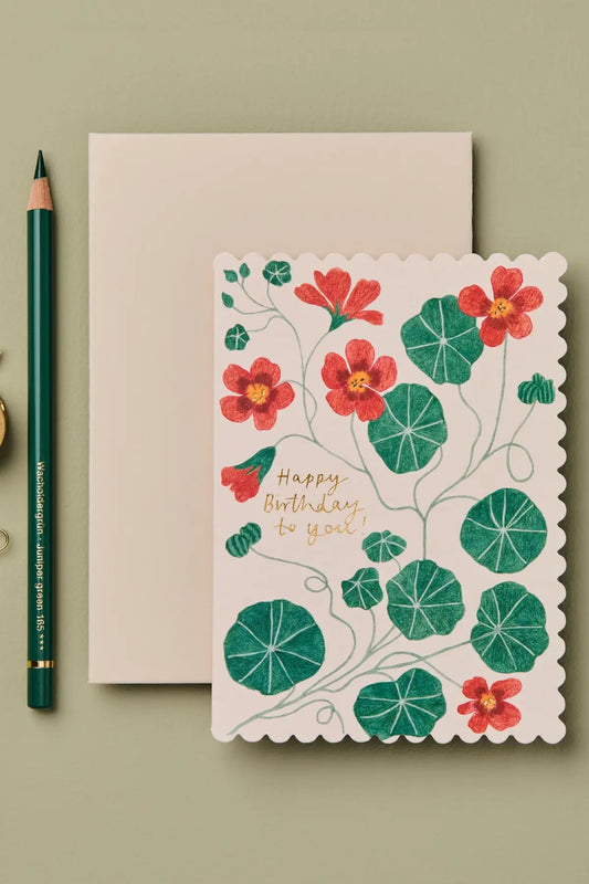 orange and green floral birthday card from wallflower blank inside