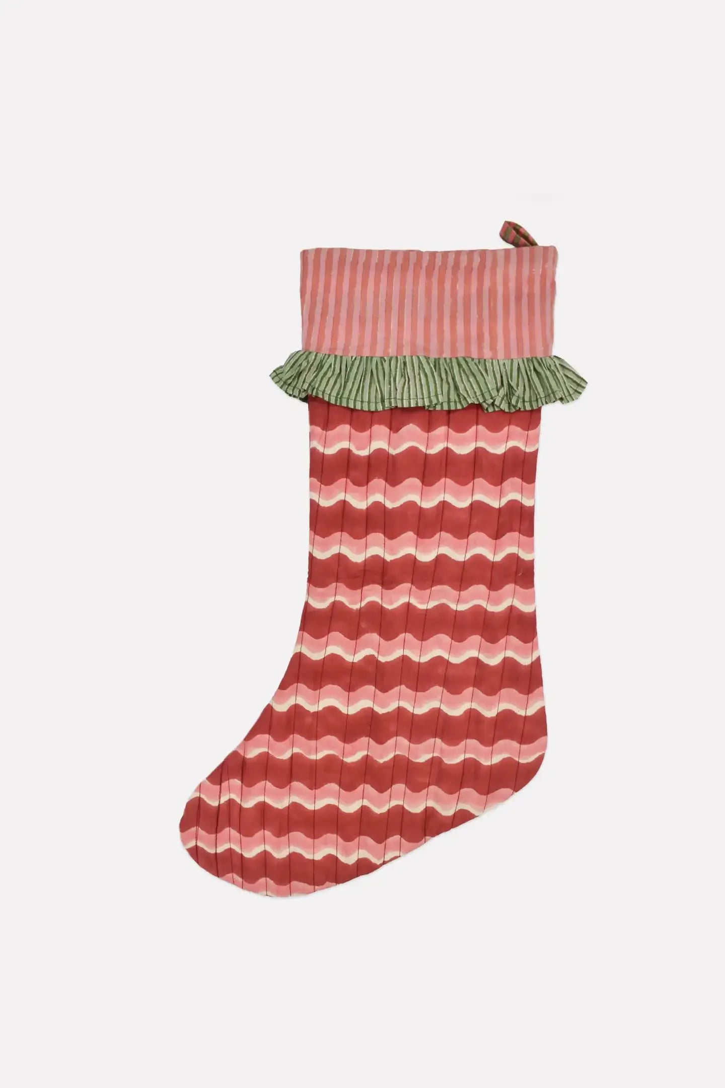 striped red and pink christmas stocking with wavy deign and green ruffles