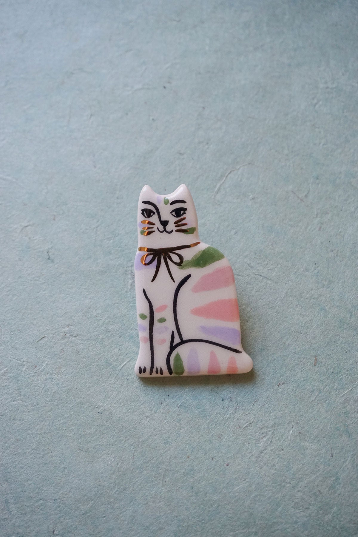 ceramic cat brooch - pastel stripes