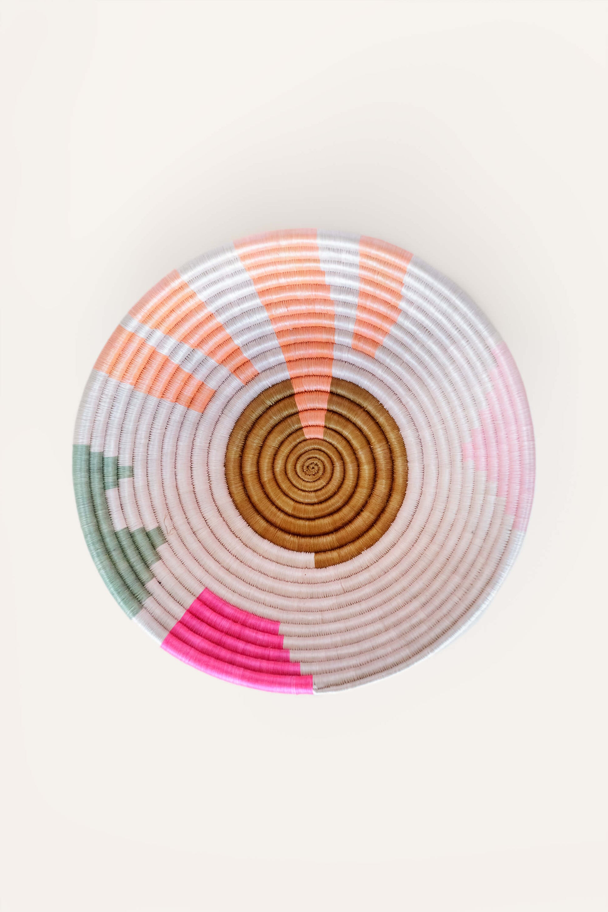pink pastel wall baskets - shop woven bowls on wallflower
