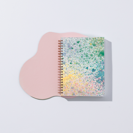 dreamy pastel blank notebook with speckle design, pink, blue, and green