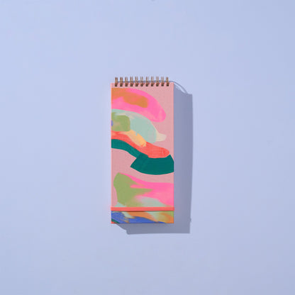 Moglea Pretty Notebook with colorful abstract design on a light blue background