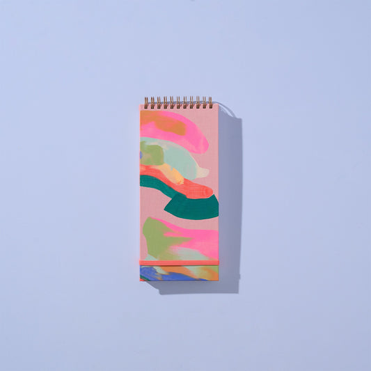 Moglea Pretty Notebook with colorful abstract design on a light blue background