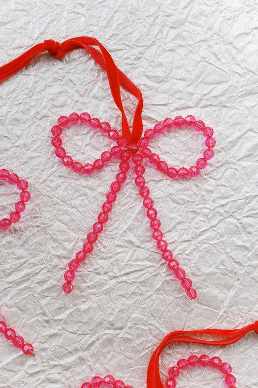 Pink bow Christmas ornament with red velvet ribbon - by wallflower