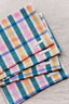 green + pink plaid party napkin by archive new york from wallflower