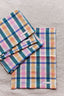 green + pink plaid party napkin by archive new york from wallflower