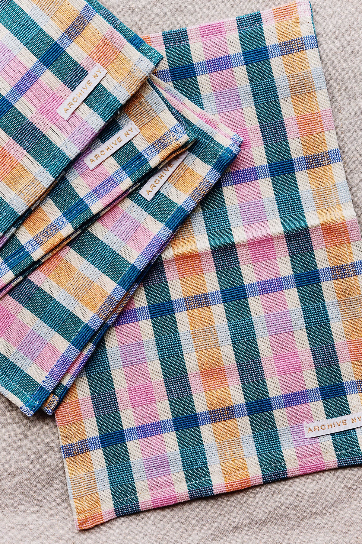 green + pink plaid party napkin by archive new york from wallflower