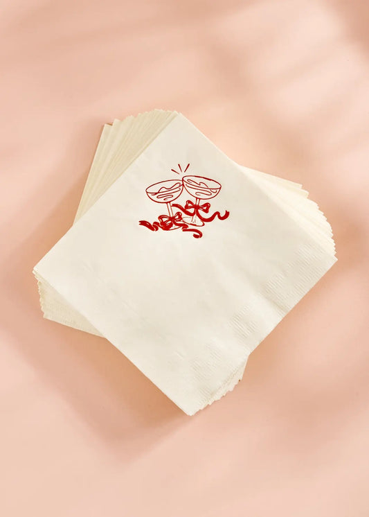 fun cocktail napkins with red champagne coupes and bows