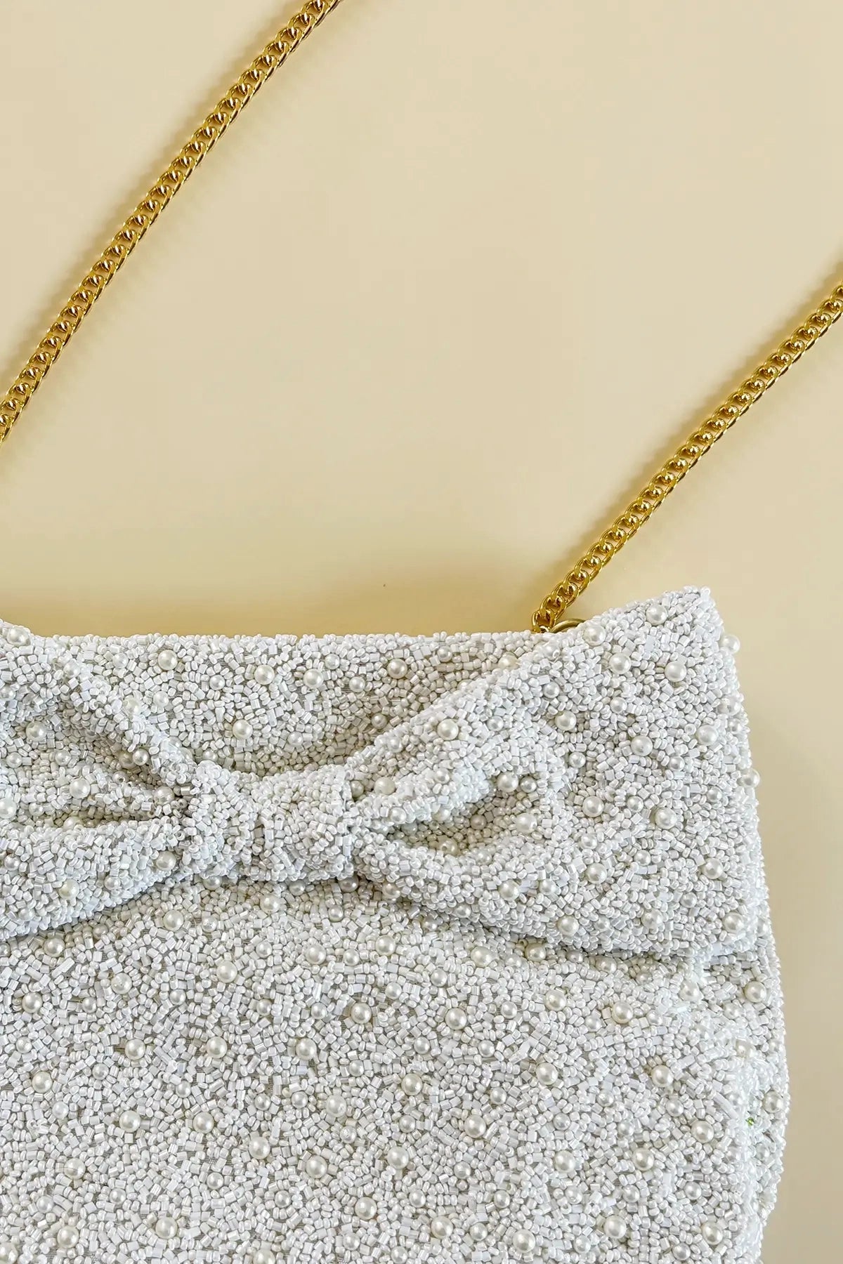 bead bow pearl clutch purse with gold chain
