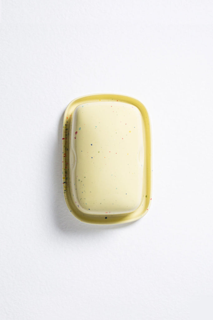 pale yellow butter dish with handpainted speckles by egg back home  ✿ shop artisan home goods on wallflower