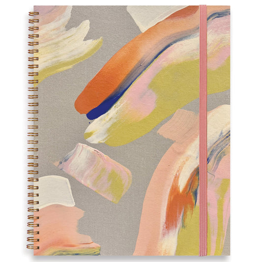 Blank sketchbook with abstract art cover featuring colorful brush strokes on a gray background by moglea