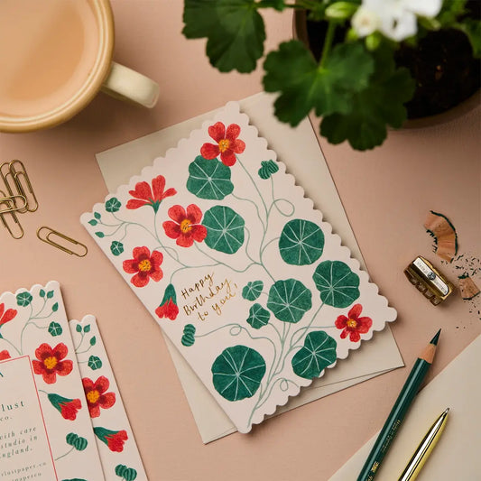 orange and green floral birthday card from wallflower blank inside