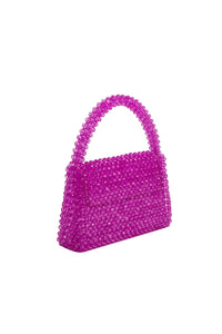 bead bag in fuchsia by melie bianco for wallflower shop