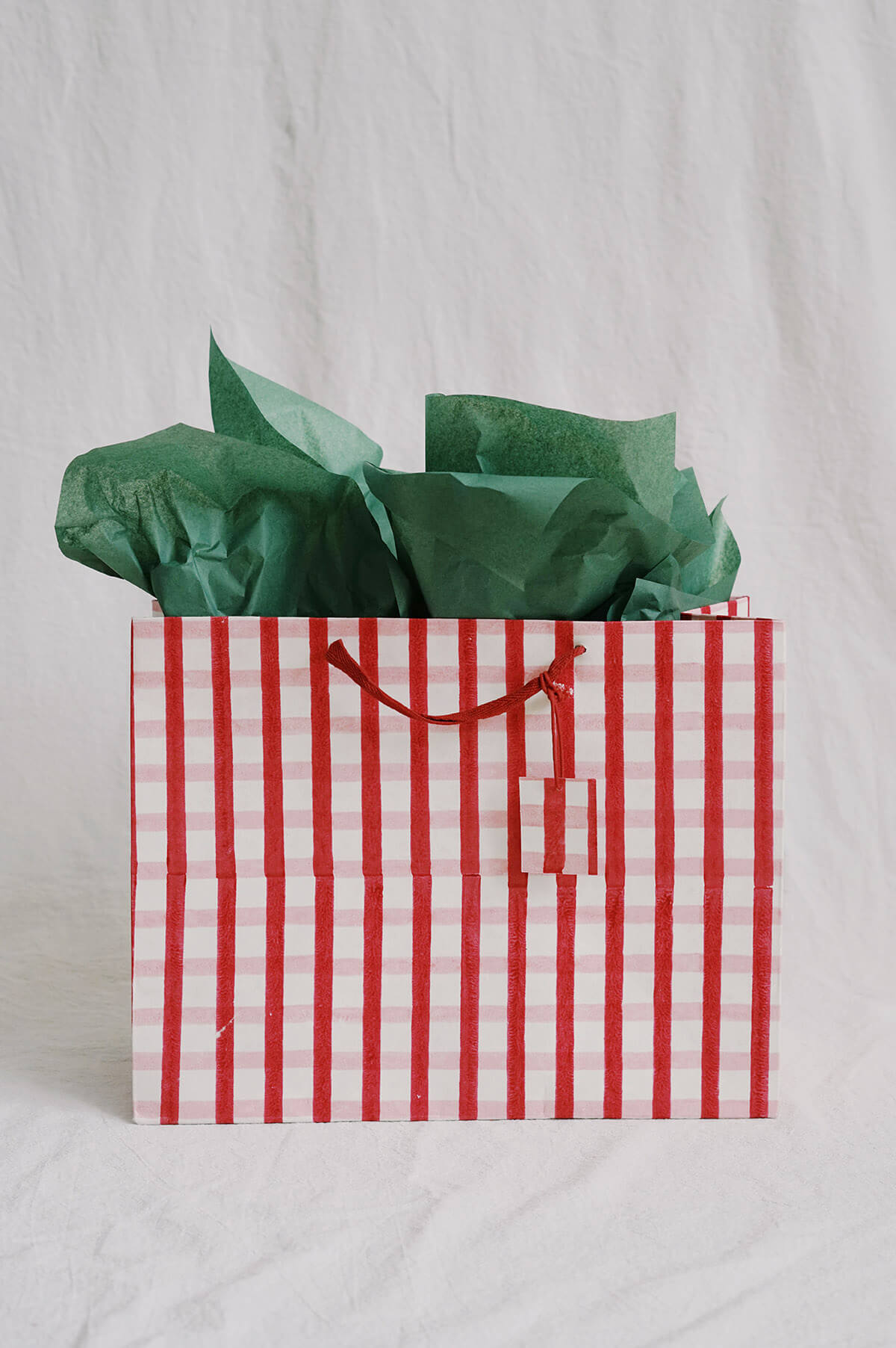 festive pink and red gingham holiday gift bag - shop eco friendly christmas gift wrapping