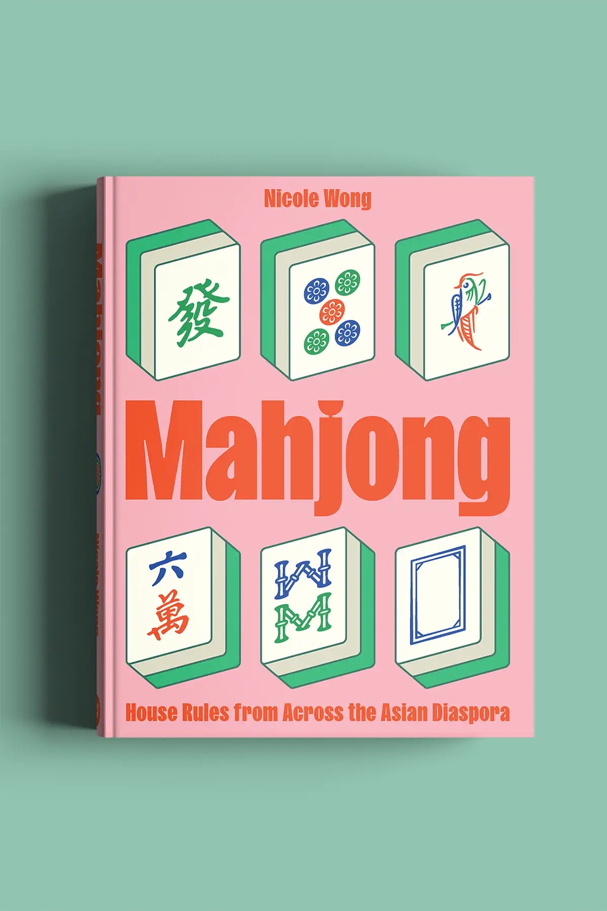 Mahjong book, House Rules from Across the Asian Diaspora' by Nicole Wong on a pink cover 