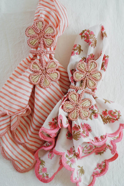 Pink floral woven napkin rings on block print napkins - shop wallflower artisan decor
