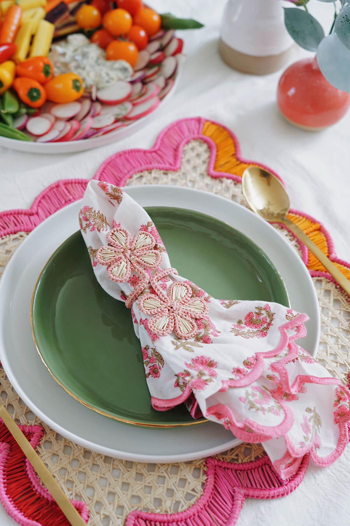 Pink floral woven napkin rings on block print napkins and colorful placemat - shop wallflower artisan decor