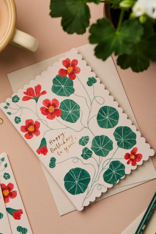 orange and green floral birthday card from wallflower blank inside