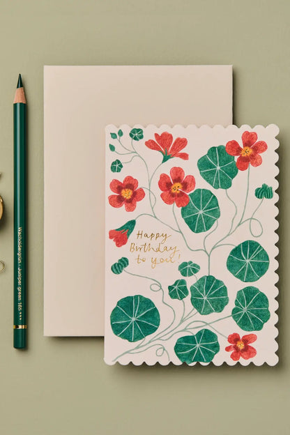 orange and green floral birthday card from wallflower blank inside