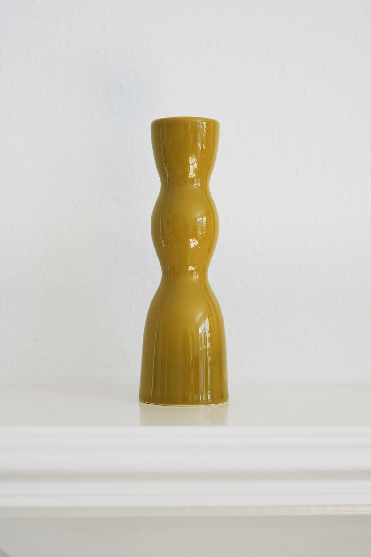wavy olive green taper candle holders ceramic from wallflower shop