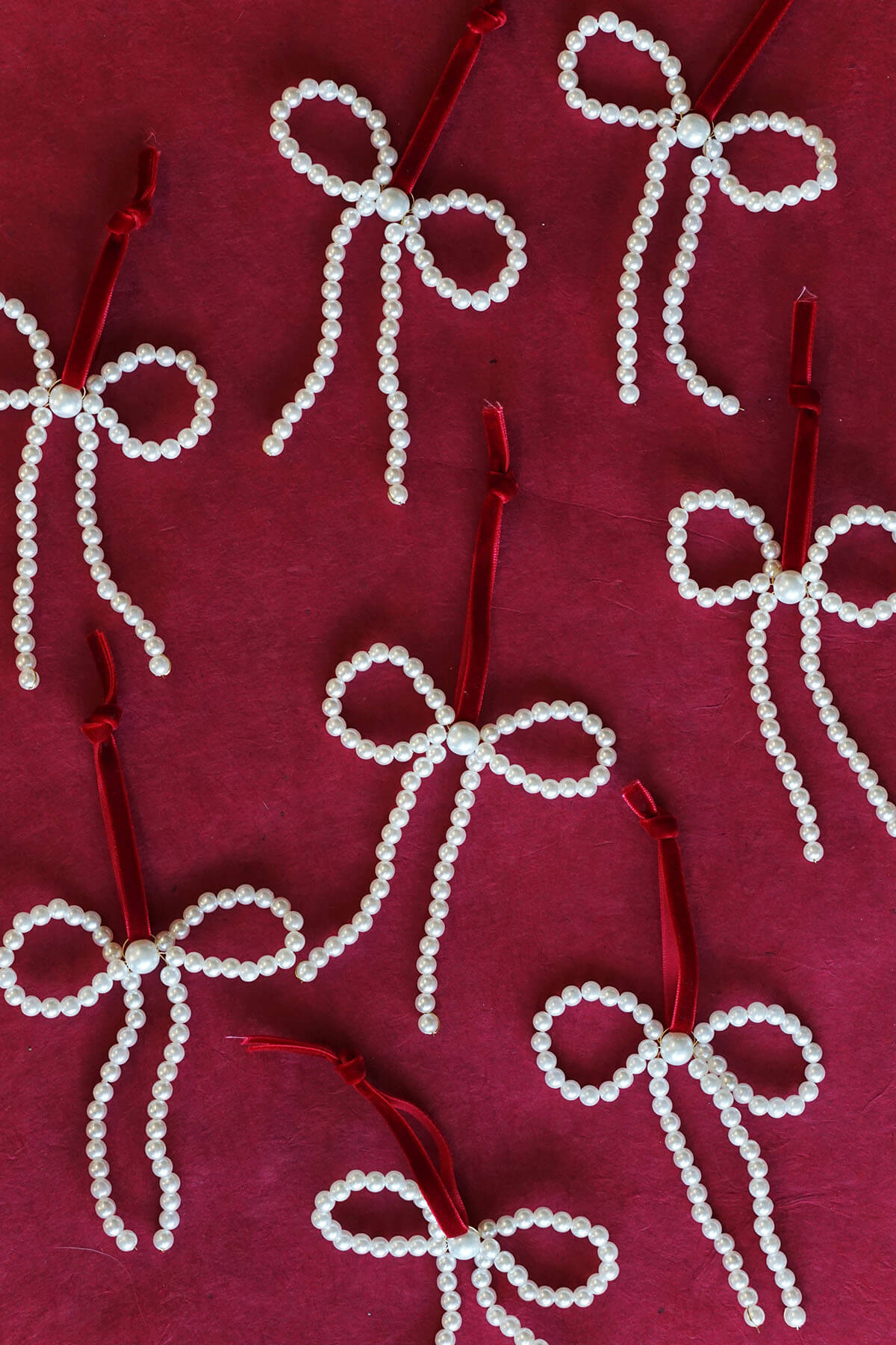 handmade pearl bow ornaments with red velvet ribbon - by wallflower shop