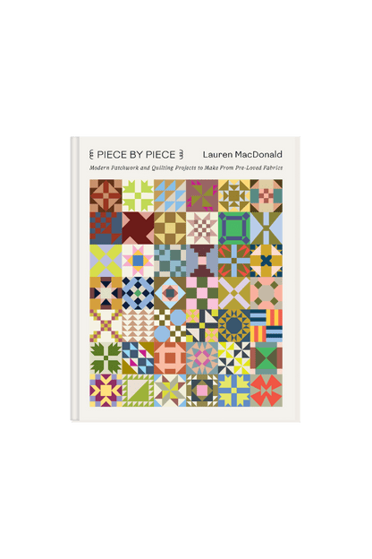 Coffee table book cover of 'Piece by Piece ' with colorful quilt pattern 