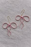 floppy oversized pink bow earrings from wallflower shop