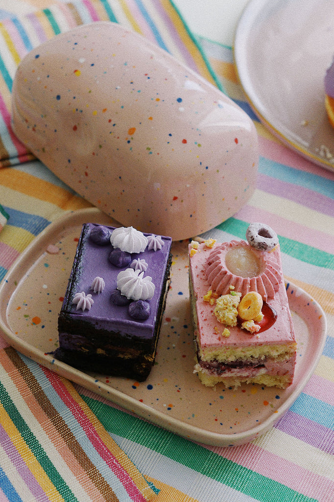 cake slices on pink egg back home butter dish from wallflower shop