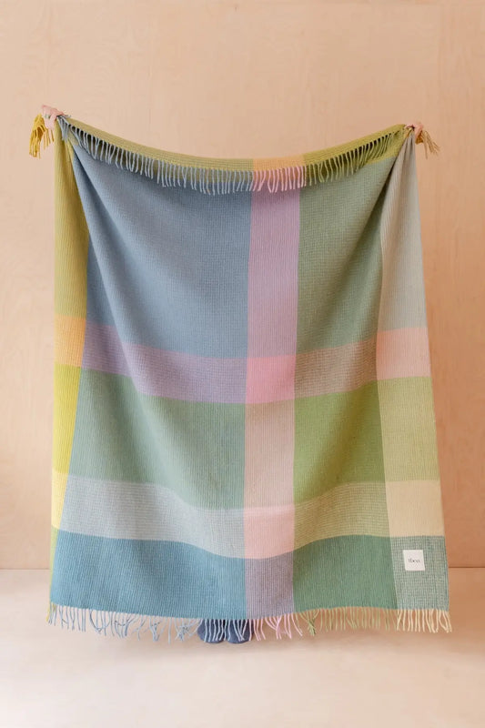 pastel plaid wool blanket in pink, green, blue and yellow