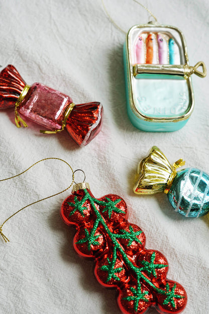 whimsical glass blown christmas ornaments from wallflower shop: candy ornaments, sardines ornament, tomatoes ornament