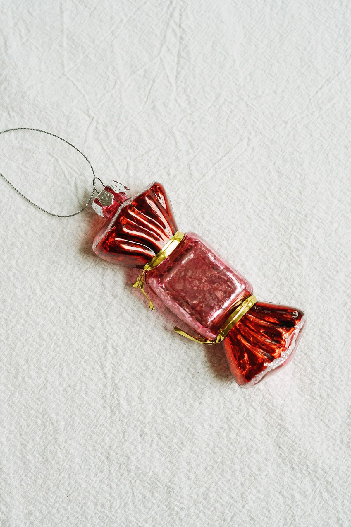 whimsical red and pink christmas candy ornament glass blown ornaments on wallflower