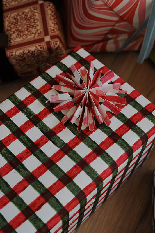cute red & green christmas gift wrap- hand painted holiday wrapping paper from wallflower with gift topper idea