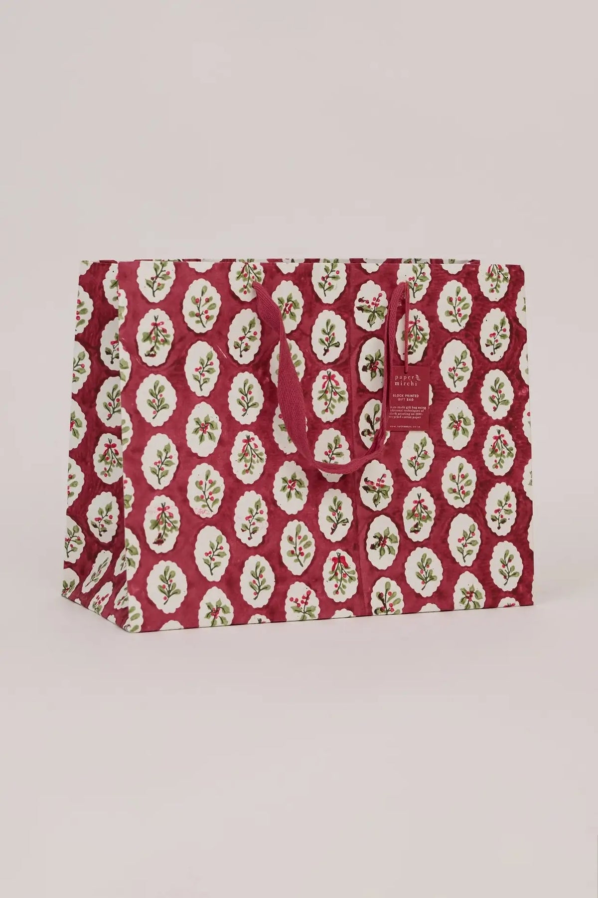 large festive christmas gift bags in red, green - hand block printed - shop holiday gifting on wallflower