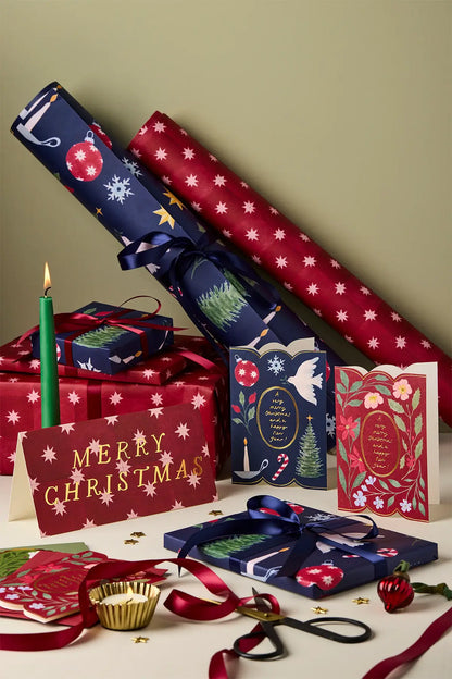 collection of wanderlust paper co handmade red christmas gift wrap sheets with stars