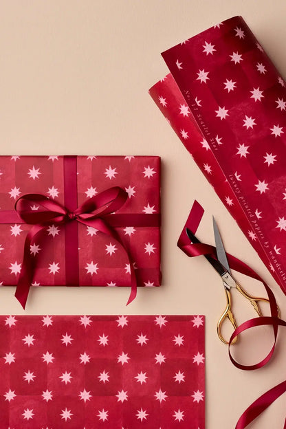 scarlet star pattern red wrapping paper from wanderlust paper co