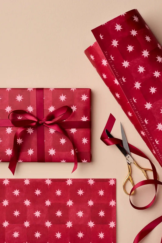 scarlet star pattern red wrapping paper from wanderlust paper co