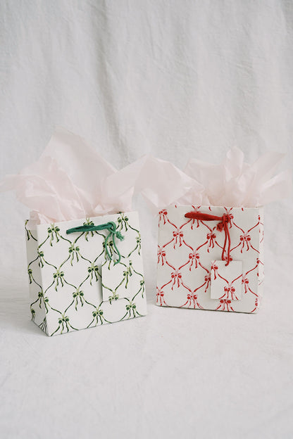 small eco friendly christmas gift bags with bows in green and red - hand block printed recycled gift bags