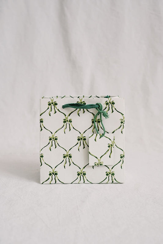 small eco friendly christmas gift bags with bows in green - hand block printed recycled gift bags