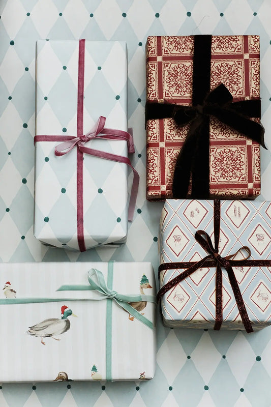 winter christmas wrapping paper on gifts from wallflower shop - snowflake, diamonds, ducks