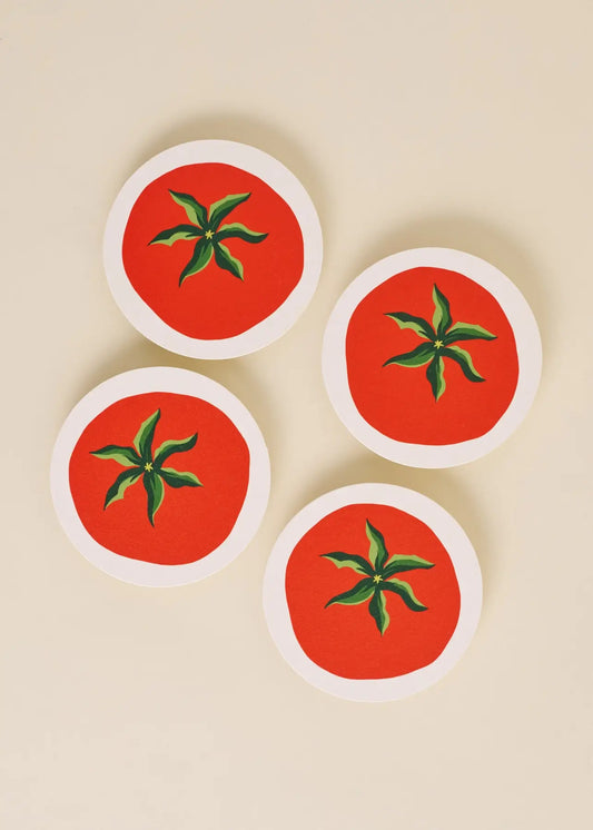 Four fun coasters with tomato design on a beige background