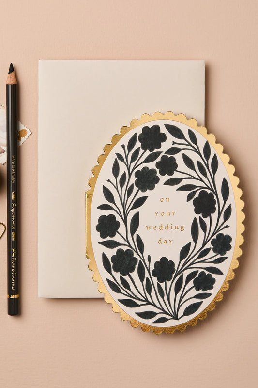 black and gold on your wedding day congratulations card with floral design