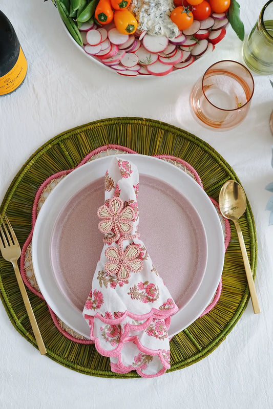 pink + green round woven placemat from wallflower shop - handmade artisan table linens & decor