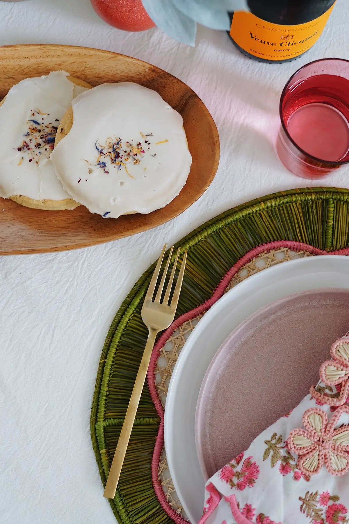 pink + green round woven placemat from wallflower shop - handmade artisan table linens & decor