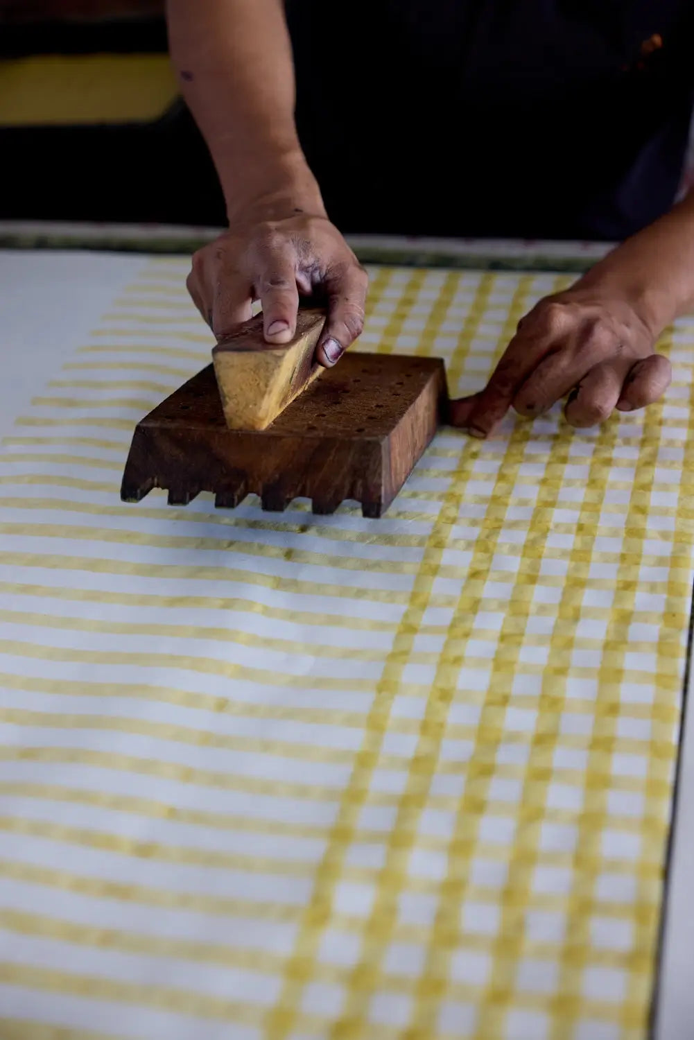 block printing process of yellow gingham print on 100% recycled cotton paper - shop blank greeting cards on wallflower