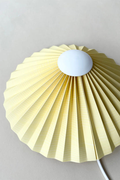pastel yellow pleated wall lamp by shady business