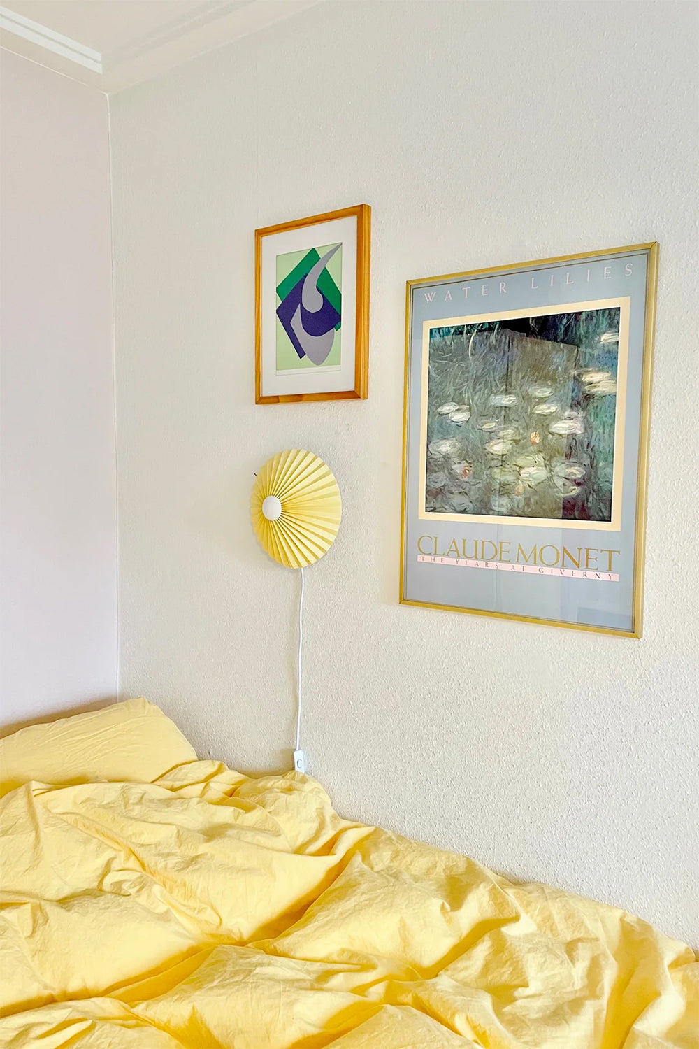 pastel yellow pleated wall lamp by shady business